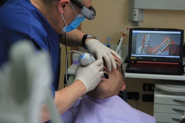 dentist working on a patients teeth